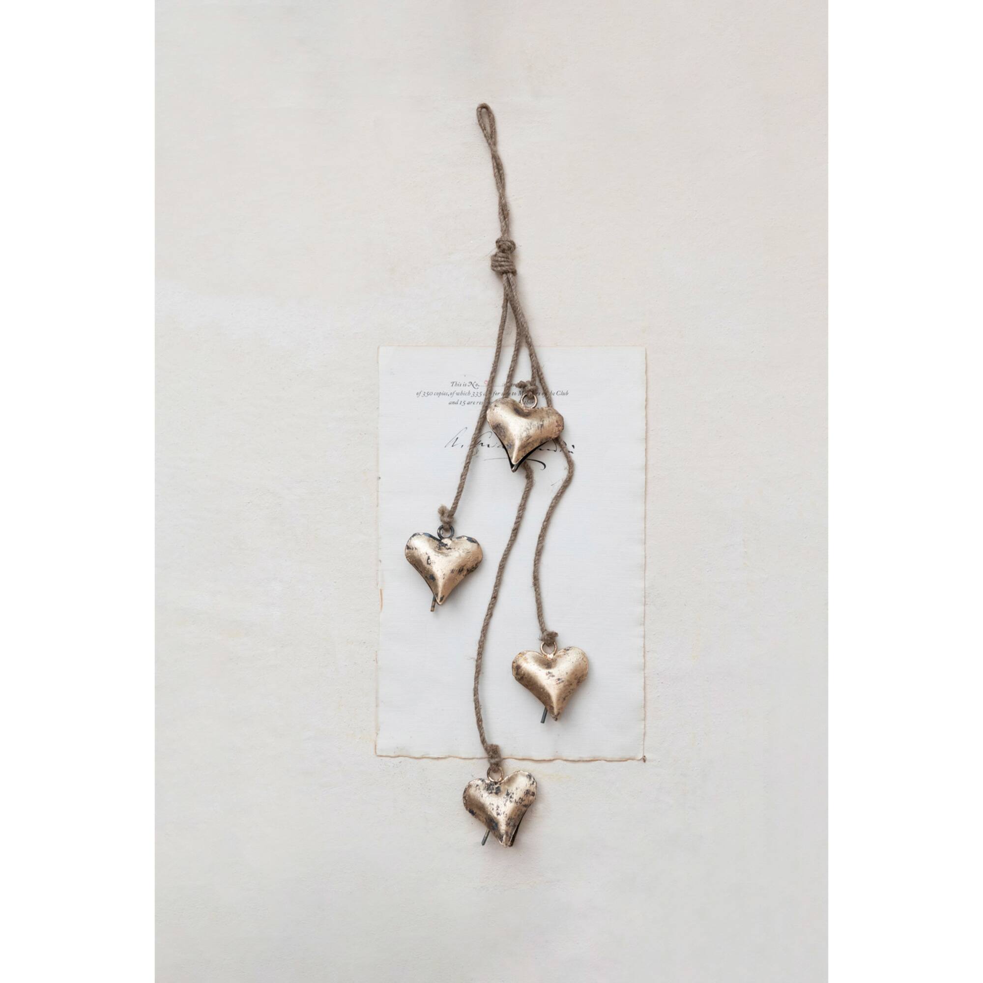 Hello Honey® 23" Metal Hearts on Jute Rope Wall Décor
